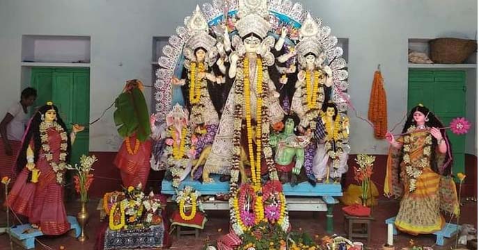 Durga here takes puja in Bengali montha agrahayana