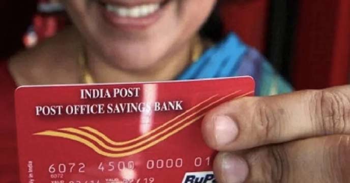 Person updating post office account online before deadline.