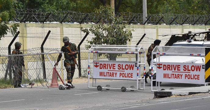 Indian Air Force personnel conducting a search operation at Bathinda military base in Punjab after a reported shooting incident.