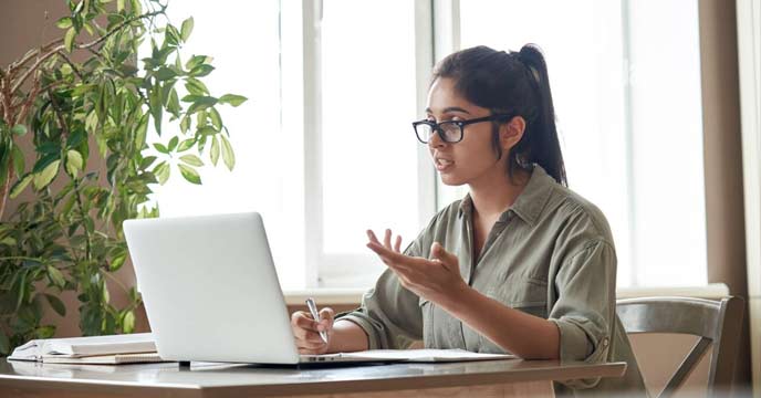Indian office girl working on computer
