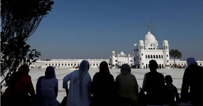 Indian Sikh pilgrims crossing the India-Pakistan border to celebrate Baisakhi