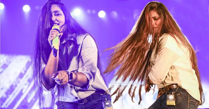 Somlata Acharya Choudhury with Open Hair and Lobster