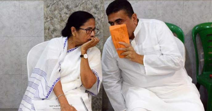 Suvendu Adhikari and Mamata Banerjee at a political rally
