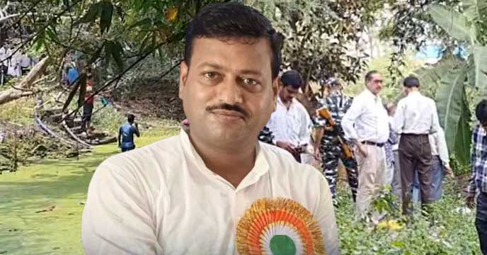 TMC MLA Jibonkrishna Sahara holding his mobile phone after retrieving it from a pond