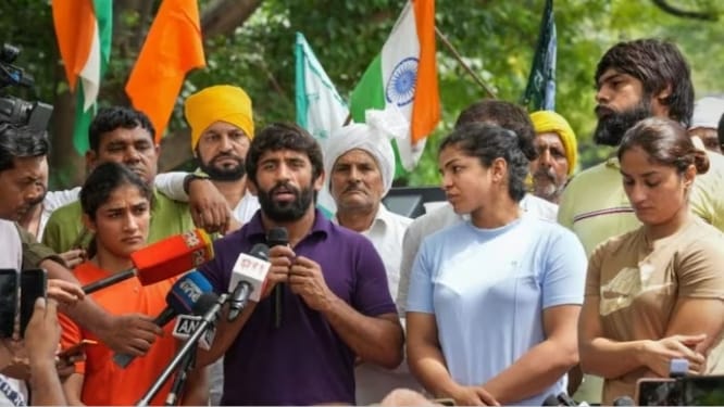 Wrestlers interacting with media
