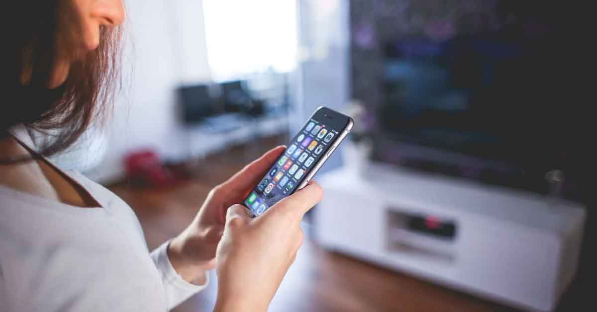 Woman Wearing White V Neck Shirt Using Spac Iphone