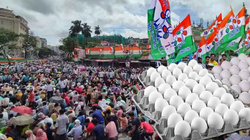 Shaheed Dharamatala Rally: A photo of a large crowd gathered at the Shaheed Dharamatala grounds in Kolkata on 21st July, likely for a political rally or event, with a sea of people and flags visible.