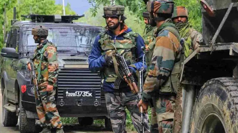 Soldier in Jammu and Kashmir standing guard in mountainous terrain