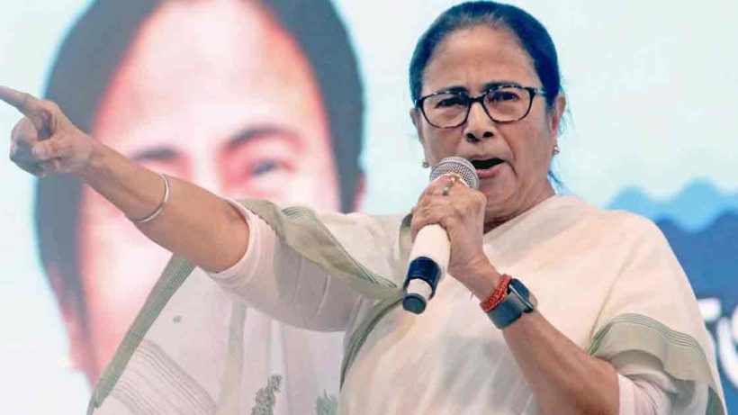 Portrait of Mamata Banerjee, the Chief Minister of West Bengal, wearing a traditional white saree and offering a namaste gesture.