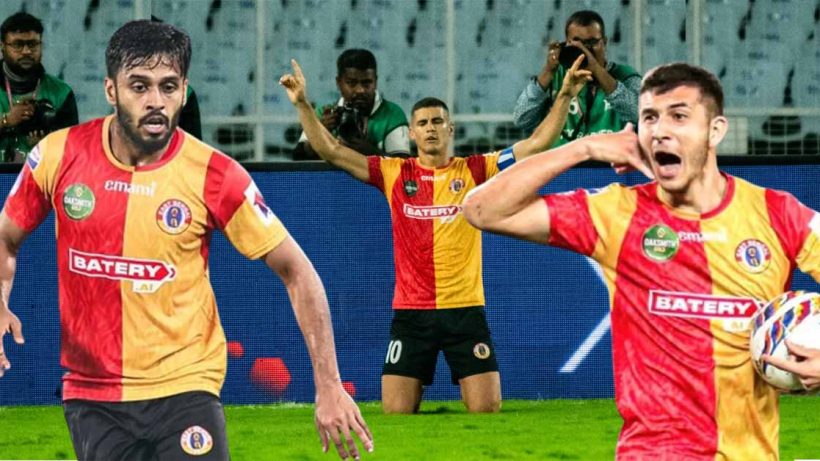 Souvik Chakrabarti punches the East Bengal captain Cleiton Silva