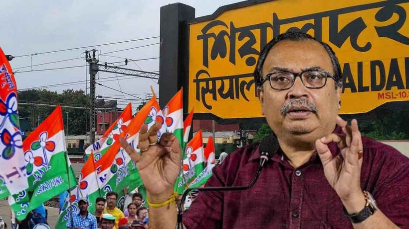 Portrait of Kunal Ghosh, Trinamool Congress leader, with a thoughtful expression, wearing a white shirt and glasses, with a subtle background.