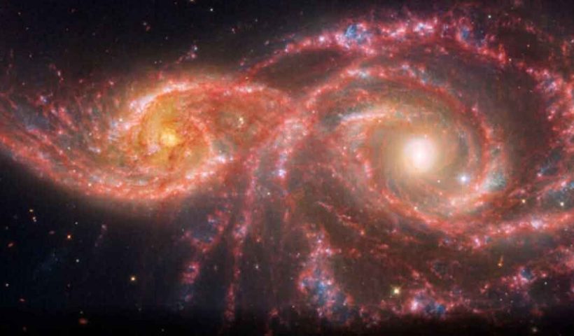 NASA's Webb and Hubble Telescopes Capture Spooky ‘Blood-Soaked Eyes’ of Galaxies IC 2163 and NGC 2207