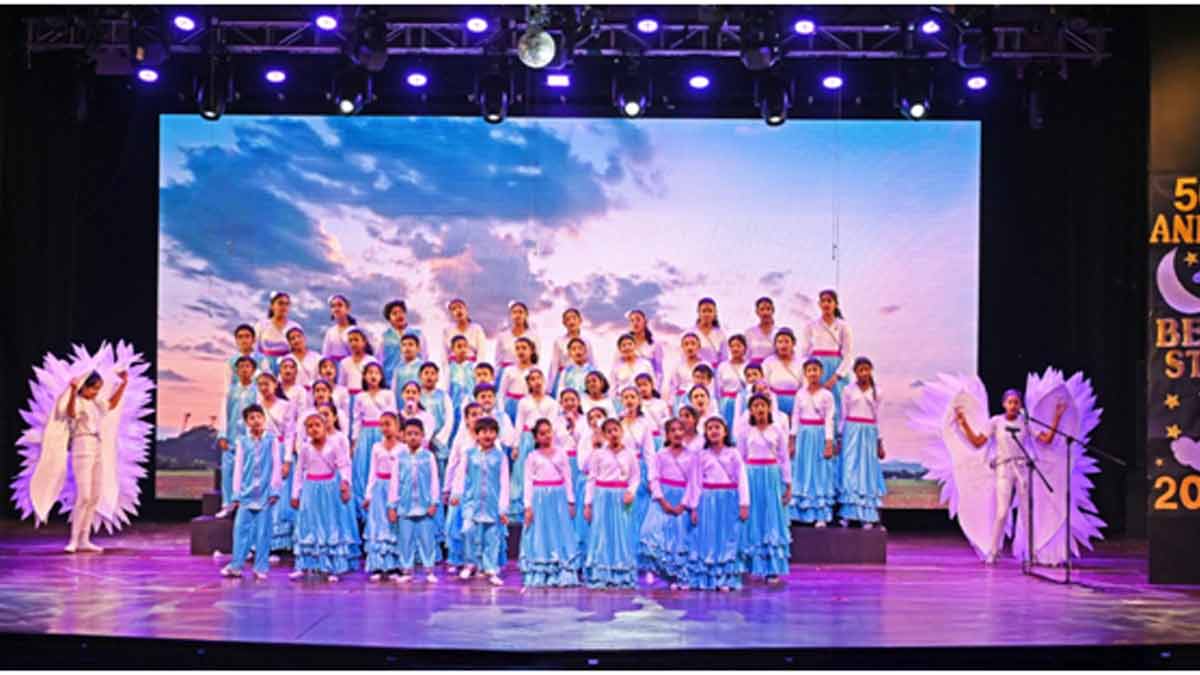 St. John's Universal School's choir singing resonant melodies at the 56th Annual Day event.