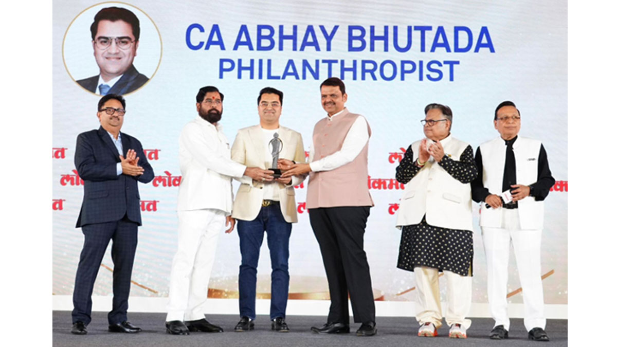 CA Abhay Bhutada receiving the Philanthropist of the Year Award 2026 from CM Shri Devendra Fadnavis and DCM Shri Eknath Shinde.
