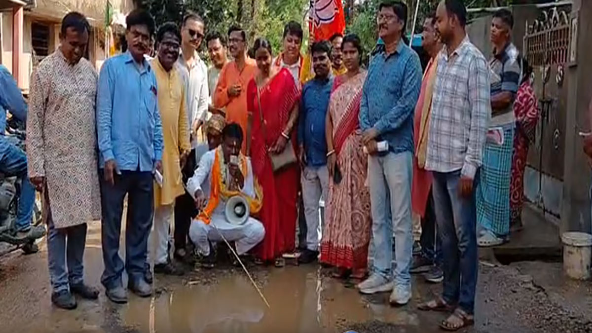 BJP Candidate Uses Flooded Streets to Catch Fish for Election Campaign