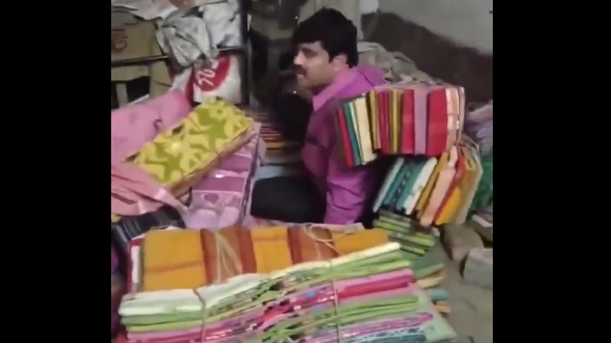 howrah-tmc-leader-brahmananda-chakraborty-hiding-under-saree-bundles-arrested